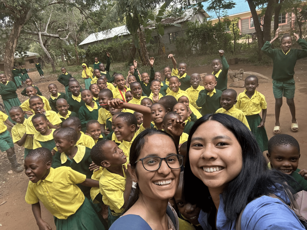 Ekta Raghuwanshi and Maria Denna with their students in Kasigau (Photo by Denna).